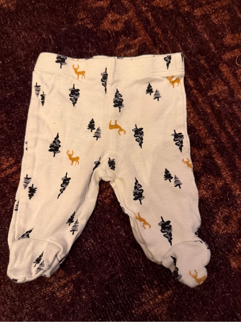 Newborn White Baby Footed Pants with Black Trees and Gold Deer